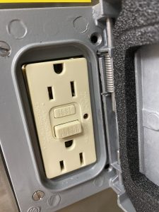 A photo of a power outlet on a Biosafety Cabinet